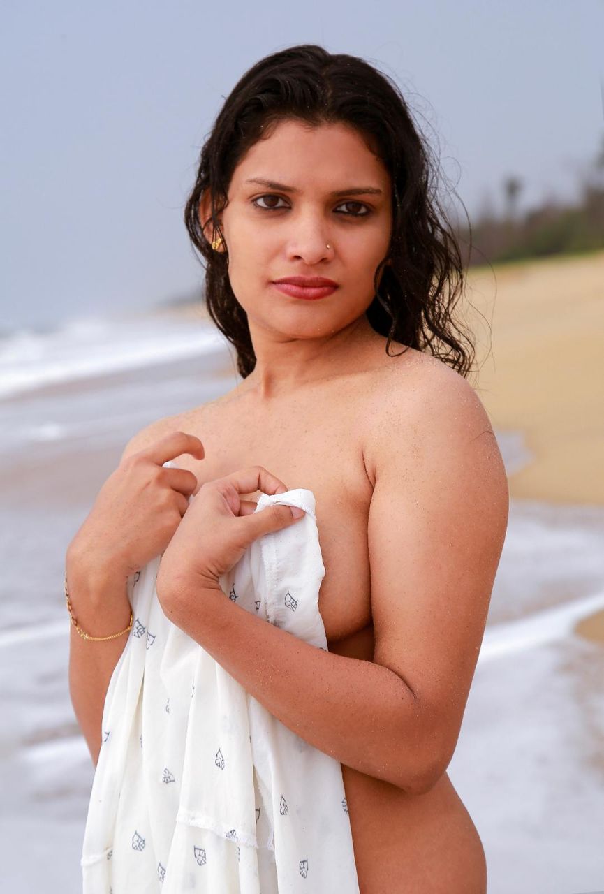 Hot Indian model posing at the beach