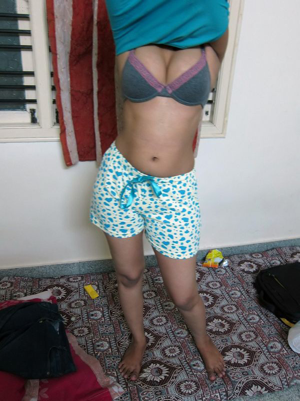 Indian hostel girl removing tank top
