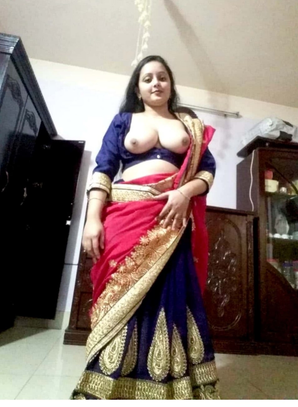 Just married bride showing breasts in saree