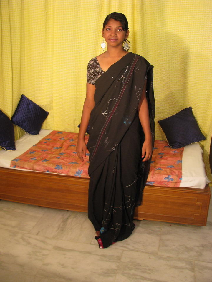 Village girl wearing black saree