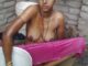 village slim woman bathing outdoor.jpg