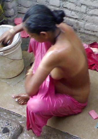 Village woman bathing