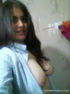 beautiful indian girlfriend topless showcases big tits 002